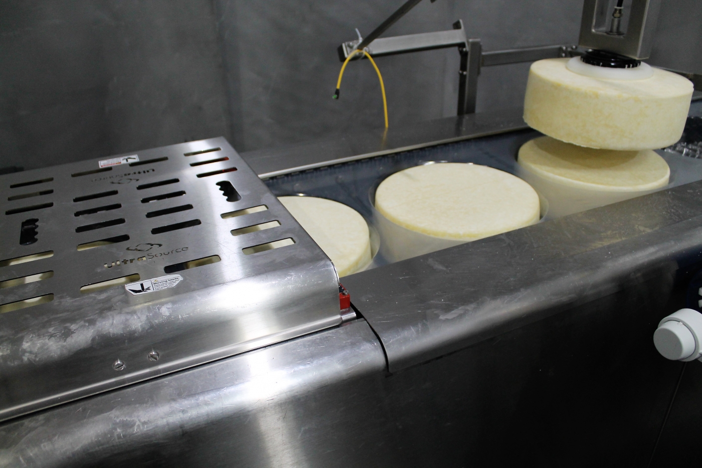 Cheese being packaged.